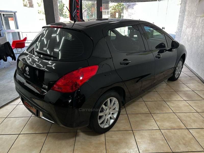 PEUGEOT - 308 - 2013/2014 - Preta - R$ 39.900,00